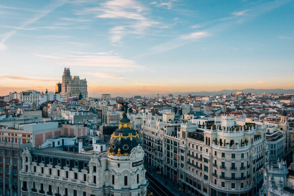 View of Gran Via from the Circulo de Bellas Artes rooftop at sunset, in Madrid, Spain